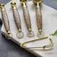 Gibb & Daan - Wooden Measuring Spoons Set-Gold Finish-Brass Inlay Handles